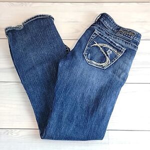 Silver Jeans Co Tuesday women's low-rise bootcut distressed blue denim. Size 26
